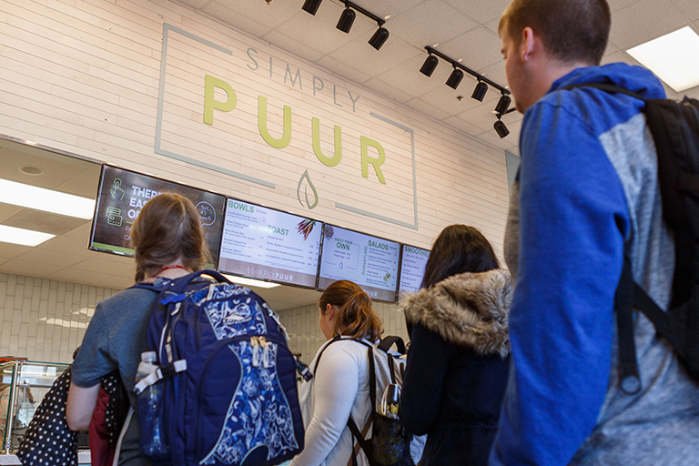 Students waiting in line at Simply PUUR.
